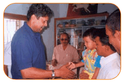 Mr. N Bitra, Friends & Family, With Mr. Kapil Dev & Sri PNV Prasad, Ex. SAAP Chairman, The occasion of Kinetic Boss Vehicle Opening at Bitra's House At Banjara Hills, Road No. 10, On 21st Oct'2002.